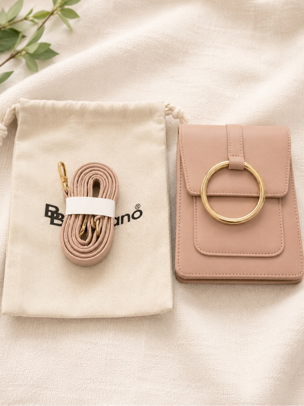 Elegant Pink Crossbody Bag with Gold Ring Accent